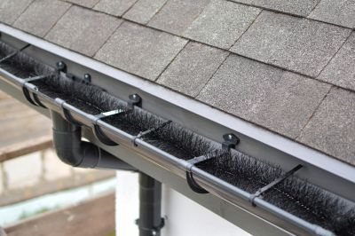 Inspecting Gutter Covers in Summer